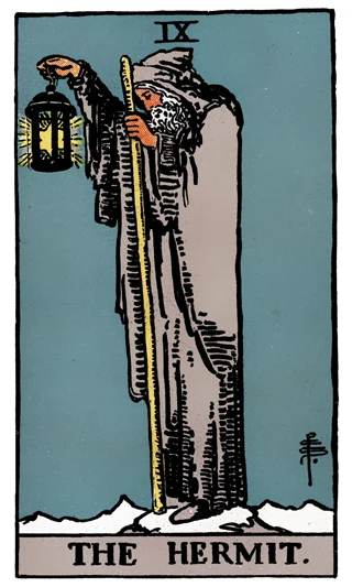 The Hermit Rider-Waite-Smith tarot card showing a robed figure on a mountain holding a lantern and staff.