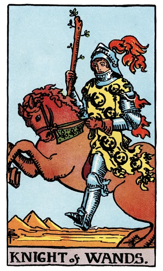 Knight of Wands Rider-Waite-Smith tarot card showing an armoured rider raising a wand on a rearing horse.