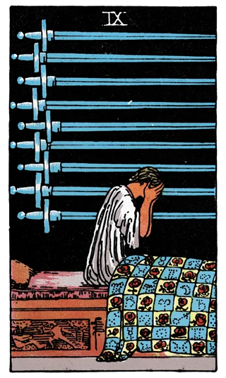 Nine of Swords Rider-Waite-Smith tarot card showing a person sitting upright in bed beneath nine swords.